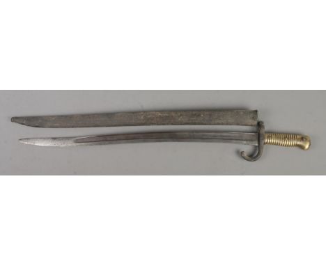 A French M1866 bayonet with scabbard. Blade inscribed to edge and dated 1868. Blade length 57cm. CANNOT POST OVERSEAS  