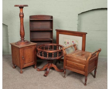Six assorted pieces of furniture. Includes open bookcase, fire screen, pine plant stand, tray on stand, commode and a small o