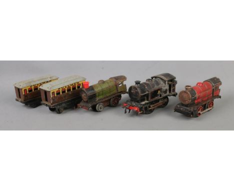 A collection of vintage O Gauge tinplate locomotives to include No. 3 82011.  