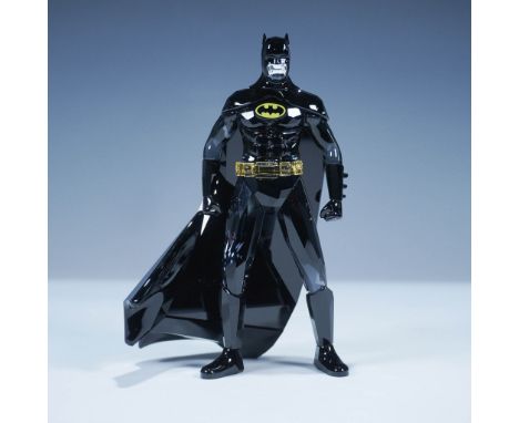 This Swarovski crystal figurine represents Batman, a central figure from the DC Comics universe. Crafted in jet black and gre