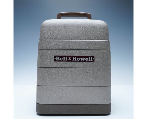 A vintage Bell &amp; Howell 16mm film projector, showcasing the brand's renowned durability and craftsmanship. This classic m