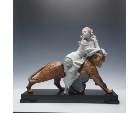 Lladro porcelain figurine titled Bacchante with Feline, model number 01011902. A captivating limited edition sculpture depict