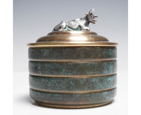 A stylish and sculptural lidded metal box by WMF (Württembergische Metallwarenfabrik), part of the renowned Ikora line. This 