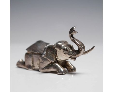 Charming Mexican sterling silver figural box modeled as a reclining elephant with raised trunk and hinged lid. Marked Mexico 