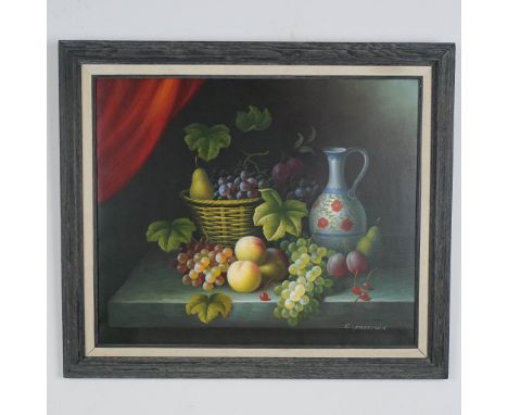 A beautifully rendered still life painting signed by artist C. Freeman, this work captures a classic composition of vibrant f