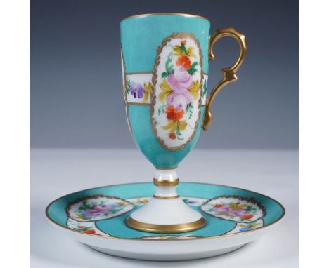 Porcelain demitasse cup by Giraud Limoges paired with a matching saucer marked Limoges France. Both pieces feature a turquois