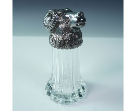 A striking figural decanter or lidded vessel featuring a finely detailed ram's head lid, likely crafted in silver plate, set 