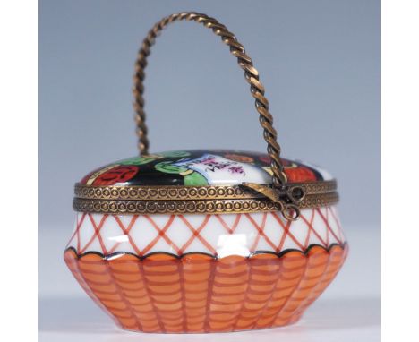 Charming hand-painted Limoges porcelain treasure box in the shape of a woven basket with a twisted bronze handle and clasp. T