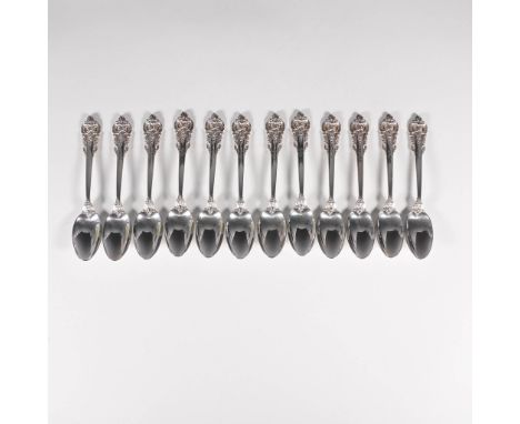 A set of 12 sterling silver teaspoons by Wallace in the renowned Grand Baroque pattern. Introduced in 1941 and designed by Wi