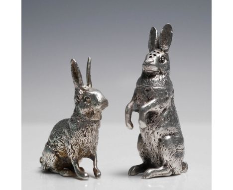 Charming pair of figural silver rabbits crafted in solid 800 silver. One rabbit stands upright with perforated head, function