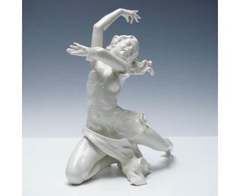 Exquisitely modeled porcelain figurine by Hutschenreuther, Germany, depicting a graceful dancing woman in a dynamic pose with