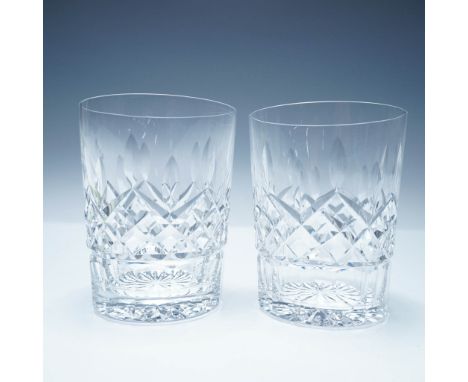 A pair of exquisite Lismore Waterford crystal double old fashioned glasses featuring the brand's signature deep wedge and cro