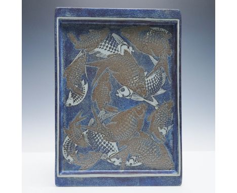 Royal Copenhagen faience tile tray featuring an intricate school of stylized fish in earthy brown over a mottled cobalt blue 