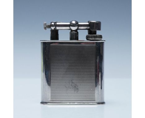A distinctive Dunhill silver-tone flask lighter, designed to mimic the form of a miniature hip flask. This piece showcases a 