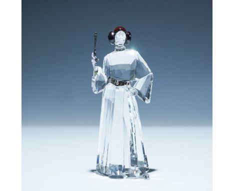Swarovski crystal figurine depicting Princess Leia from the Star Wars franchise. This detailed model is crafted from clear cr