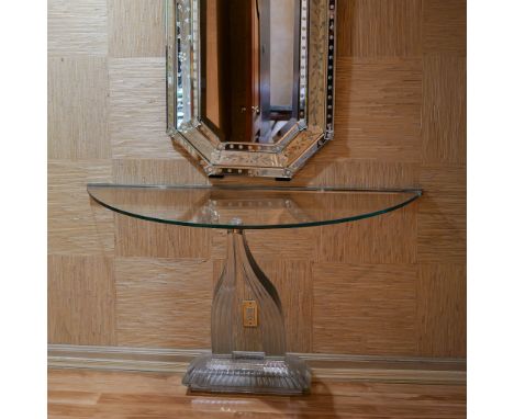 A masterfully designed Baccarat console table featuring two gracefully arched supports composed of ribbed clear crystal. Thes