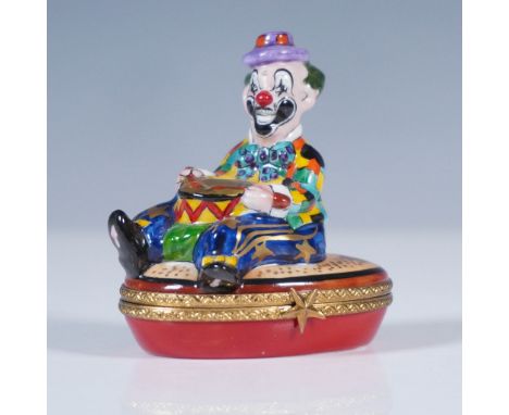Hand-painted Limoges porcelain treasure box titled “La Vie en Rose,” featuring a vibrantly dressed clown seated and playing a