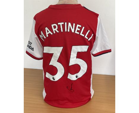 Gabriel Martinelli signed Arsenal replica home football shirt. Size medium. Good condition. All autographs are genuine hand s