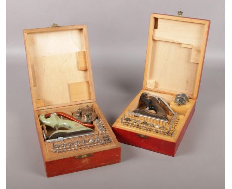Two vintage cased staking sets for watchmaking, Swiss made, La Favorite.  One complete.