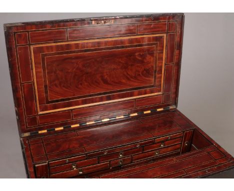 A late 19th early 20th century carpenters tool chest. Having an inlaid mahogany fitted interior with hinged compartment and d