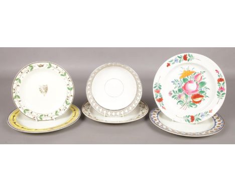 A collection of 19th century pottery. Includes creamware plates, silver lustre dish, and a plate painted in coloured enamels,
