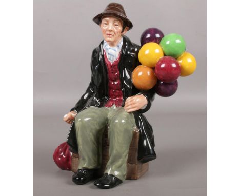 A Royal Doulton ceramic figure. The Balloon Man HN1954.  