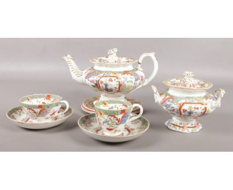 A collection of early 19th century Masons Ironstone teawares, pattern number 223. Teapot, sucrier and two cups and saucers wi