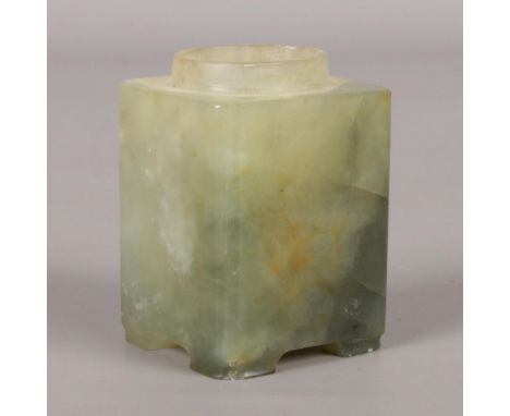 A Chinese Qing dynasty miniature pale green jade square vessel of archaistic form. With reeded corners and raised on bracket 