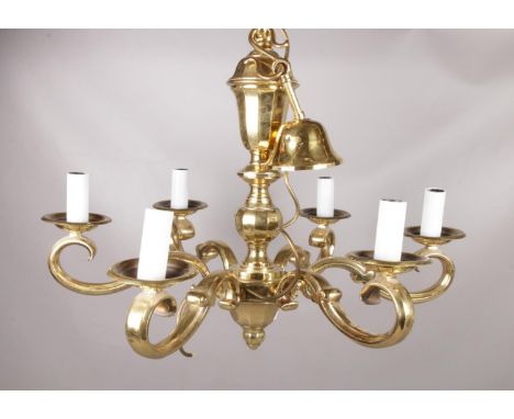 A heavy brass six branch chandelier. Height 53cm, Width 66cm. Approximately 10kg.  