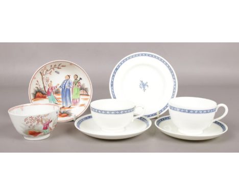 A New Hall tea bowl and saucer decorated in polychrome enamels with the boy and butterfly pattern along with Royal Worcester 