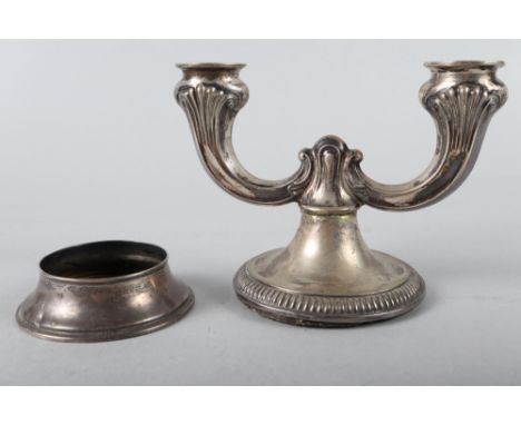 A Danish silver two-light table candelabra with weighted base, 4 3/4" high, and a silver pin dish with weighted base 