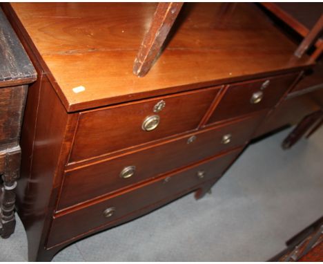An Edwardian walnut chest of two short and two long drawers, on bracket feet, 37" wide x 18 1/2" deep x 35 1/2" high