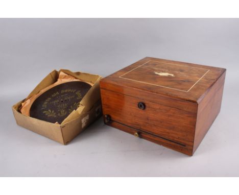 A Douglas & Co walnut cased polyphon with eight additional discs, 6 1/2" high x 12 1/4" wide x 11" deepCondition:It plays wel