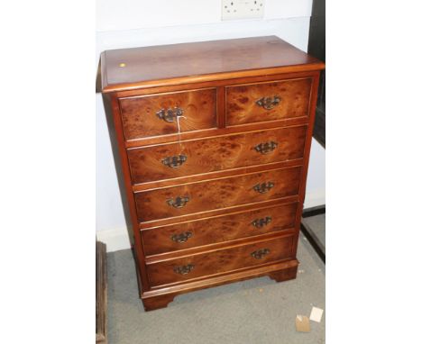 A burr elm chest of two short and four long drawers, on bracket supports, 14 1/4"deep x 24" wide x 34 1/2 hCondition:Mug stai