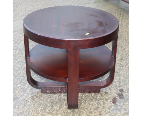 An Art Deco design hardwood two-tier occasional table, 26" dia x 24" high, a smaller similar table, 19" dia x 24" high, and a