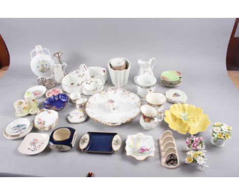 A Coalport "Strawberry" pattern strawberry basket, an Aynsley moonflask, 7 1/2" high, three jelly moulds, Carltonware dishes,