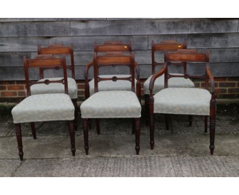A set of six late 19th century carved bar back dining chairs with stuffed over seats upholstered in a light blue fern pattern