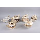 A mid 19th century teapot and stand with floral panel decoration on a blue ground, another teapot
