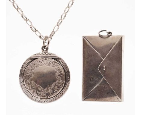 Early 20th century novelty white-metal stamp case in the form of an envelope, stamped 'STERLING', together with a George VI s