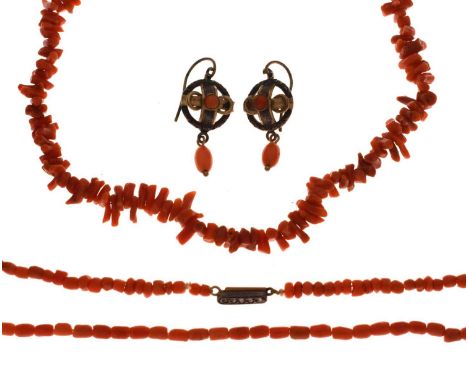 Two coral necklaces, one of beaded form with a paste set white metal clasp; and a pair of coral drop earrings (3)