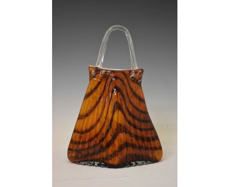 20th century 'tortoiseshell' glass vase, of 'handbag' form with clear glass handle over tapered eliptical body with vertical 