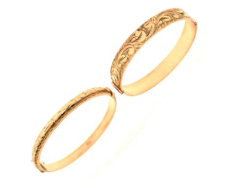 9ct gold snap bangle having foliate engraved decoration, 8.9g approx, and a '9ct' rolled gold hinged bangle, 19.2g gross appr