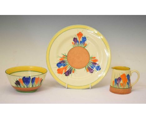 Clarice Cliff 'Autumn Crocus' plate, sugar bowl, and conical milk jug, each painted with crocus sprays and green, yellow and 