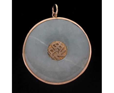 Chinese jade disc pendant within yellow metal surround, unmarked, 48mm diameter approx 