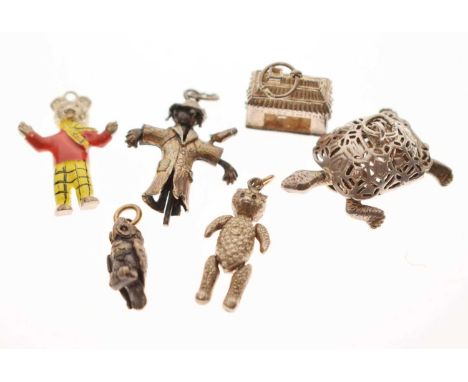 Group of assorted silver charms, comprising three articulated examples - a scarecrow, 33mm high, teddy bear, and turtle or to