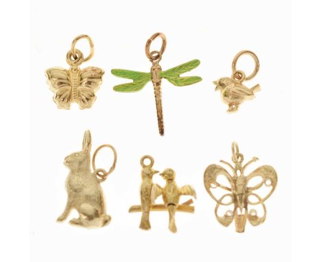 Assorted 9ct gold and yellow metal animal charms, comprising a seated rabbit or hare, 19mm high, two butterflies, pair of lov