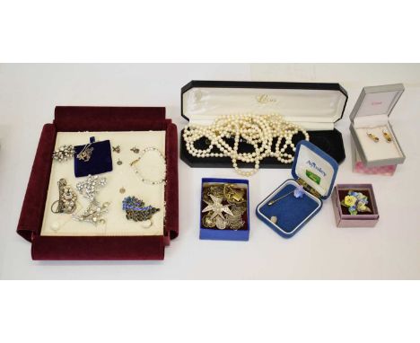 Costume jewellery to include an amber silver bracelet and earrings, both boxed, faux pearl necklaces, paste brooches, ceramic