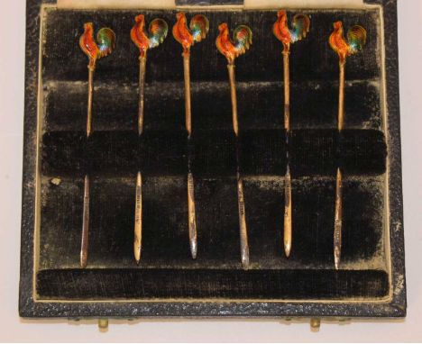 Cased set of six silver gilt and enamel cocktail sticks with cockerel finials, sponsor's mark of Adie Brothers Ltd, Birmingha