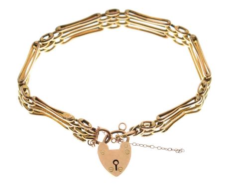 Late Victorian gate link bracelet, unmarked, the heart-shaped padlock clasp stamped '9ct', 18.5cm long approx, 9.3g approx