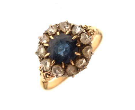 Late 19th / early 20th century sapphire and diamond cluster 18ct gold ring, round sapphire within a border of eleven rose cut